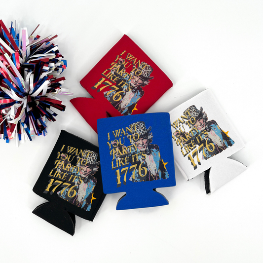 Red, White, Blue nad black collapsible can cooler displayed on a white background with a red, white, and blue metallic pom pom in the foreground. The graphic features a vintage style illustration of a man wearing a leopard print hat with bold text that reads “I Want You To Party Like It’s 1776.” Full color patriotic graphic printed on the front of the white drink sleeve style can cooler.