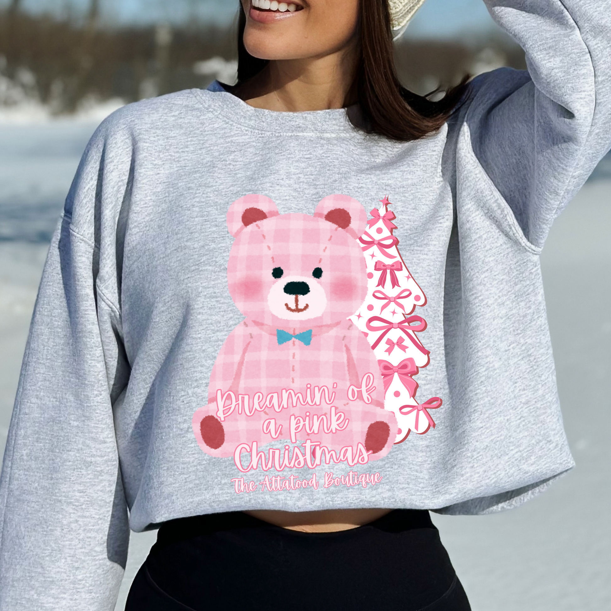 oversize pink plaid teddybear with white Christmas tree with pink bows on a gray sweatshirt. Text says Dreamin of a pink Christmas Customize with business name, city, state or both.