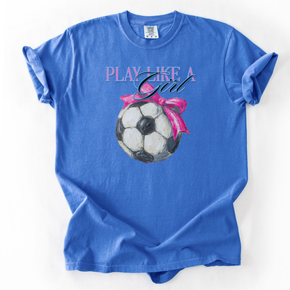 Blue t-shirt with soccer ball graphic and 'Play Like a Girl' text on a white background