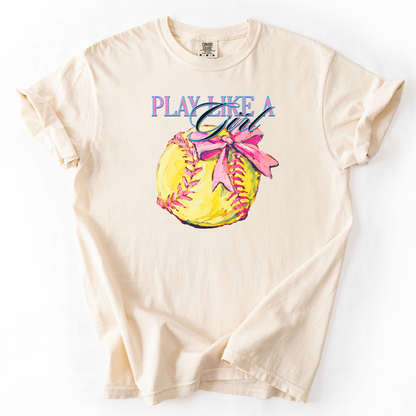 ivory t-shirt with a graphic of a softball and text 'Play Like a Girl' on a white background