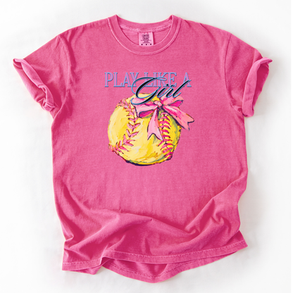 pink t-shirt with a graphic of a softball and text 'Play Like a Girl' on a white background