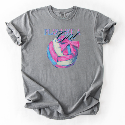 Play like a girl pink blue and white volleyball graphic with a bow on a gray comfort colors tee