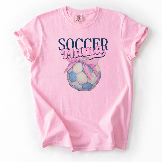 Pink t-shirt with 'Soccer Mama' soccer with a bow graphic on a white background