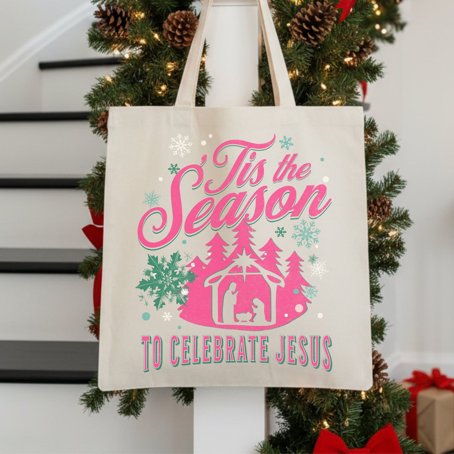 Tote bag with Christmas design and text 'Tis the Season to Celebrate Jesus' 