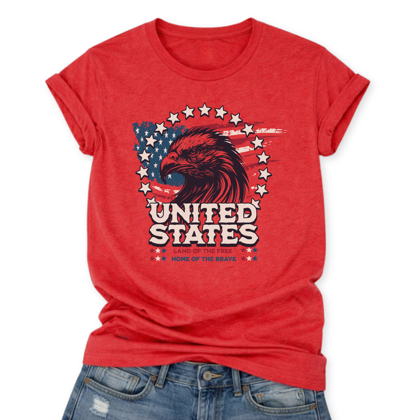 Flat-lay patriotic graphic on a Heather Red t-shirt featuring an eagle over a distressed American flag with stars and “United States”, "Land of the Free", and "Home of the Brave" text.