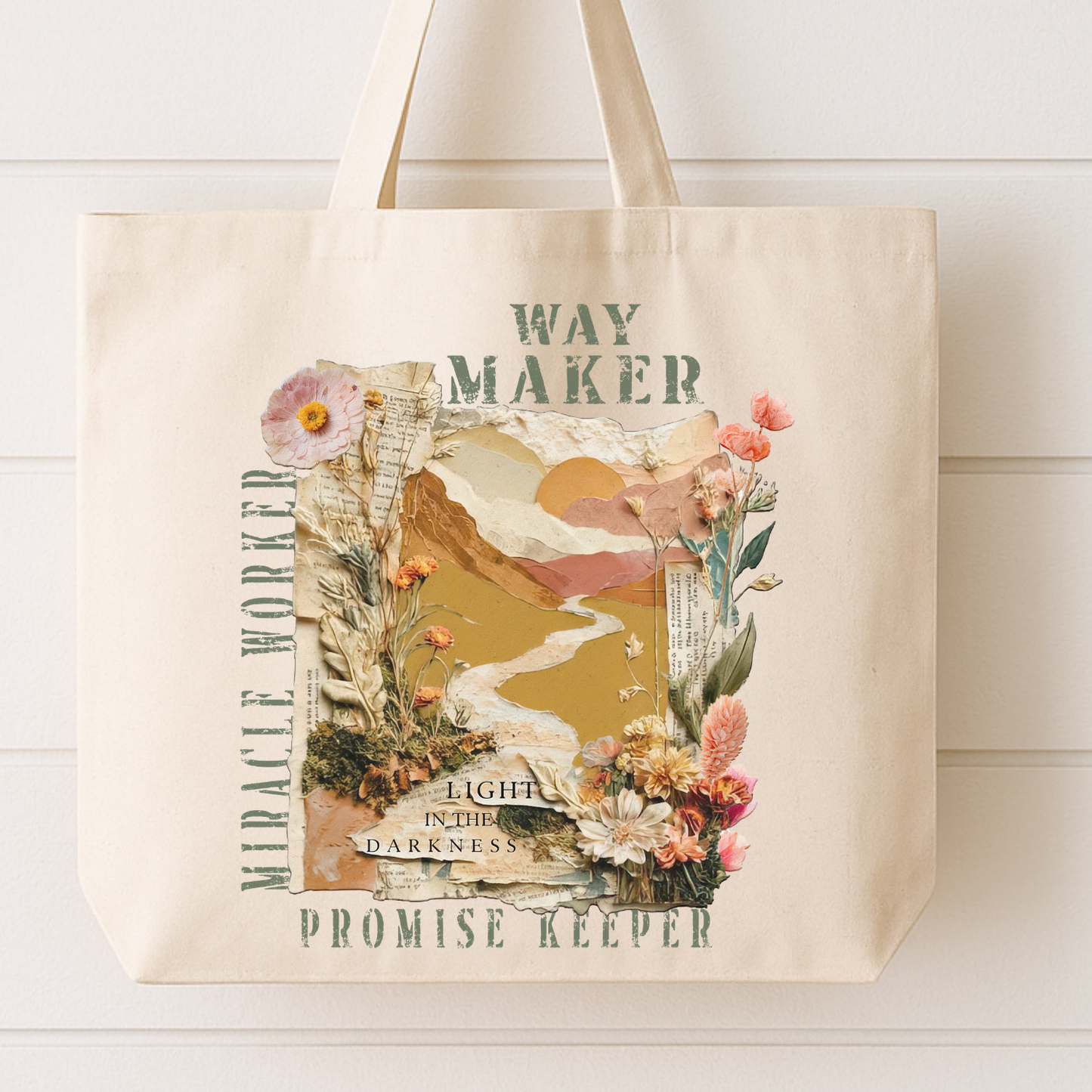 Tote bag with nature-themed design and text on a white background. MIracle Worker, Way Maker, and Promise Keeper