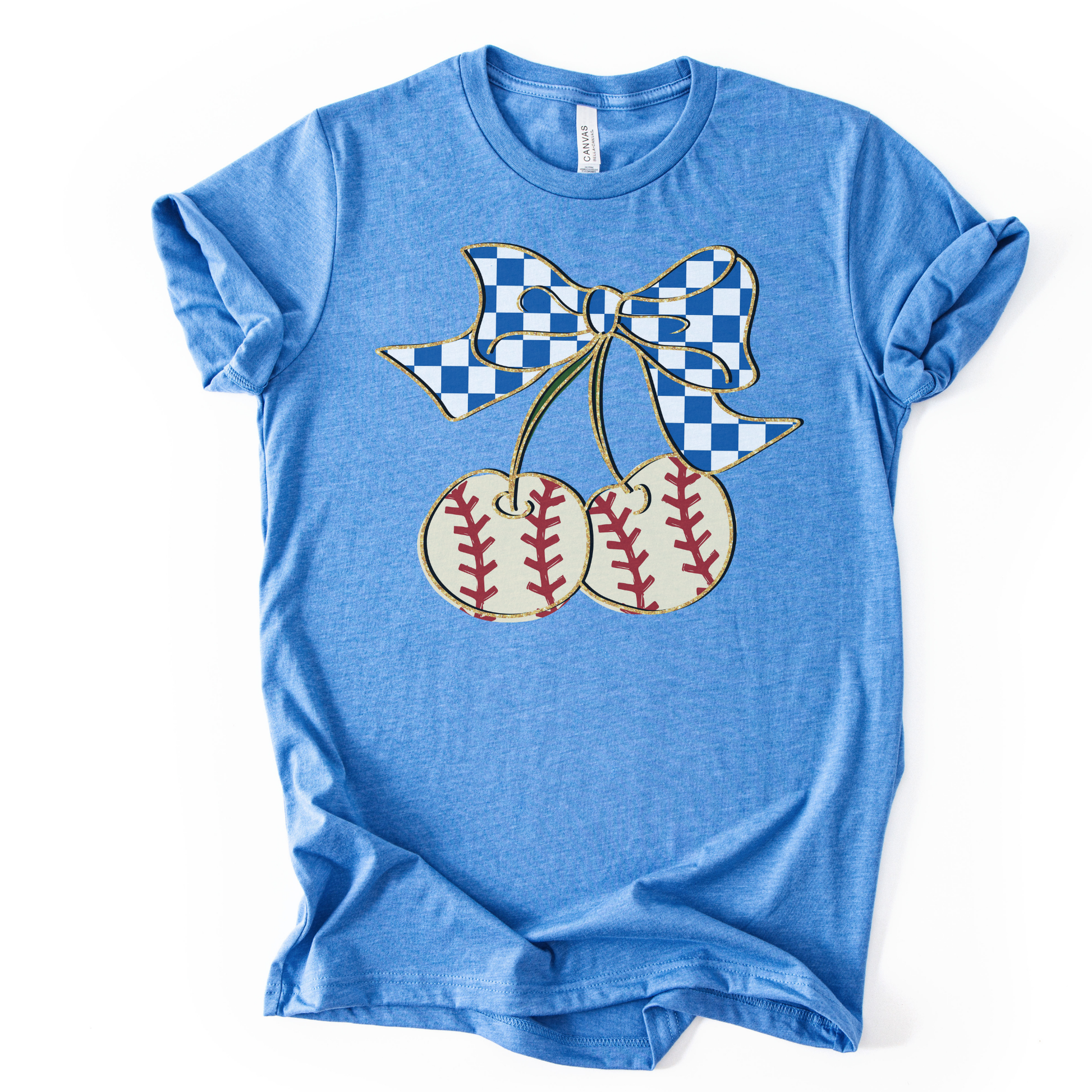 Blue t-shirt with a graphic of cherries and a checkered bow on a white background