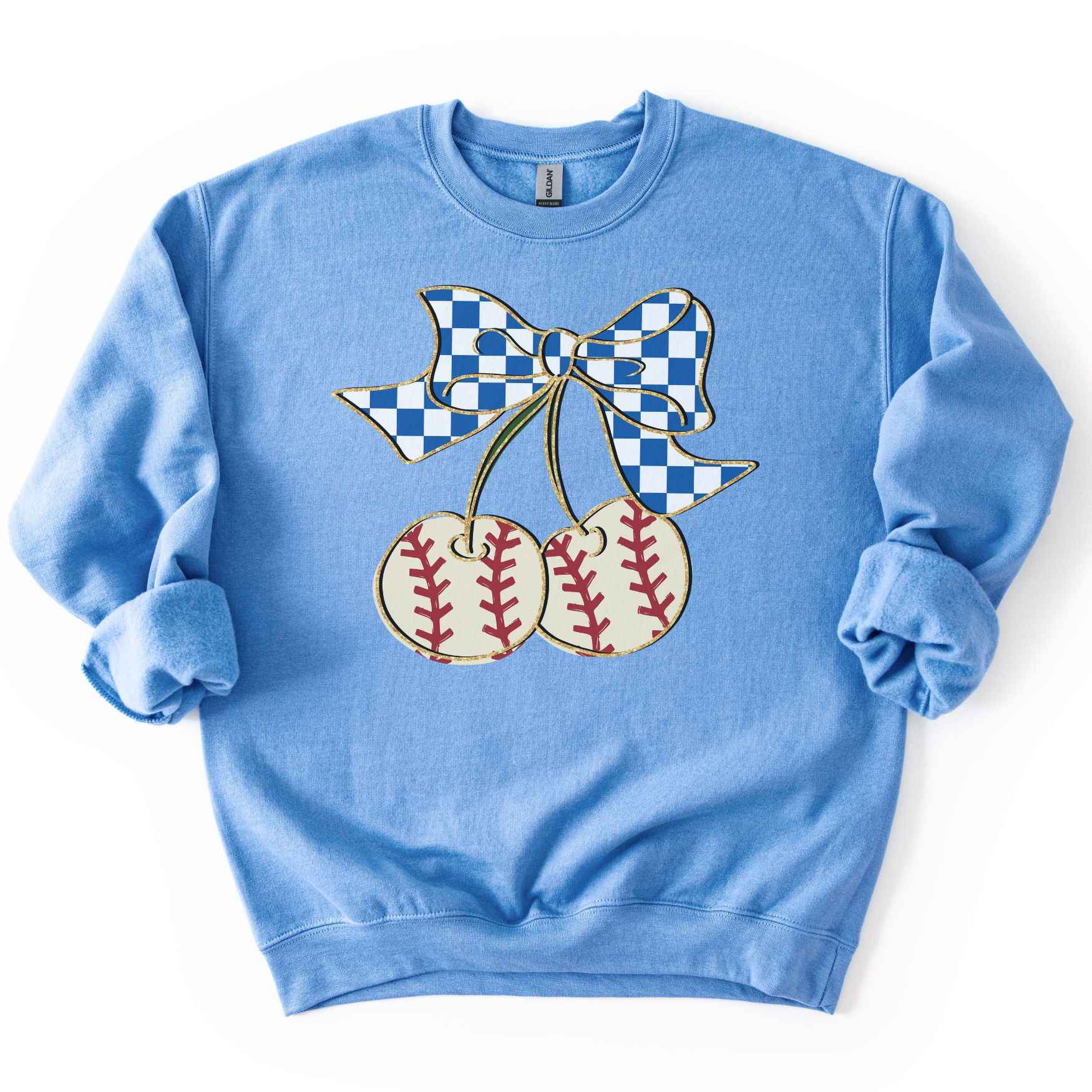 blue crewneck sweatshirt featuring a blue gingham bow tied to two cherry-shaped baseballs with red stitching, styled flat with sleeves scrunched