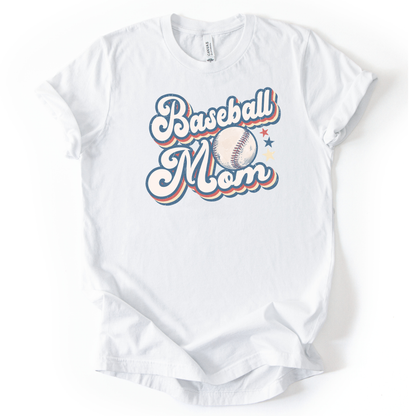 Solid white blend graphic t-shirt with retro-style “Baseball Mom” lettering, baseball graphic, and star accents, laid flat with rolled sleeves.