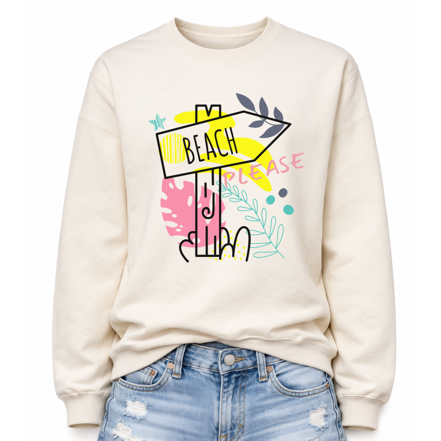 Beach themed graphic on a classic off white crewneck sweatshirt. The design features a stylized beach direction sign with the word Beach centered inside the arrow, surrounded by colorful coastal inspired shapes and decorative elements. The phrase Beach Please is incorporated into the graphic, creating a playful vacation themed design with bright tropical accents.