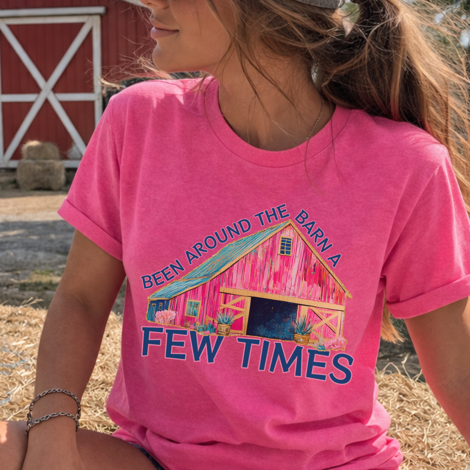 been around the barn a few time featuring a colorful pink barn on a bella canvas heather charity pink t-shirt