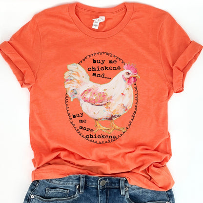 Buy me chickens and buy me more chickens on a heather orange bella canvas tshirt featuring a white chicken