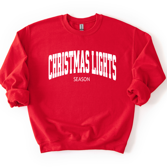 Christmas lights season on a red sweastshirt