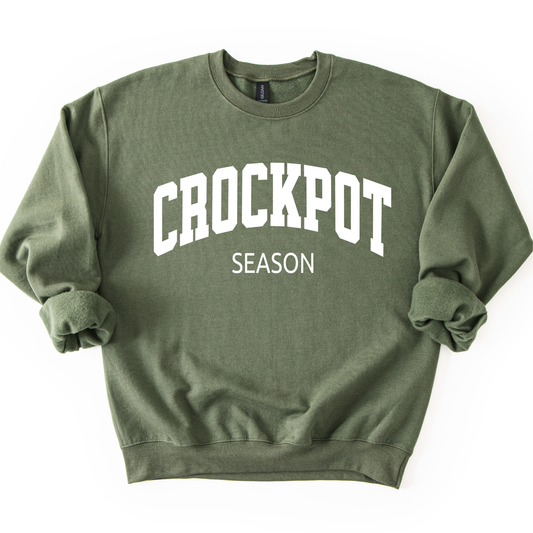 crockpot season letter graphic on a military green sweatshirt