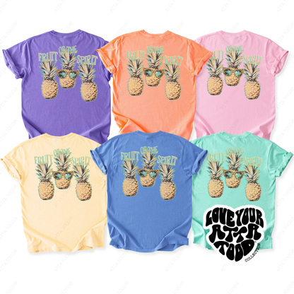 Set of colorful t-shirts with pineapple graphics and text on a white background.  Fruit of the spirit. 