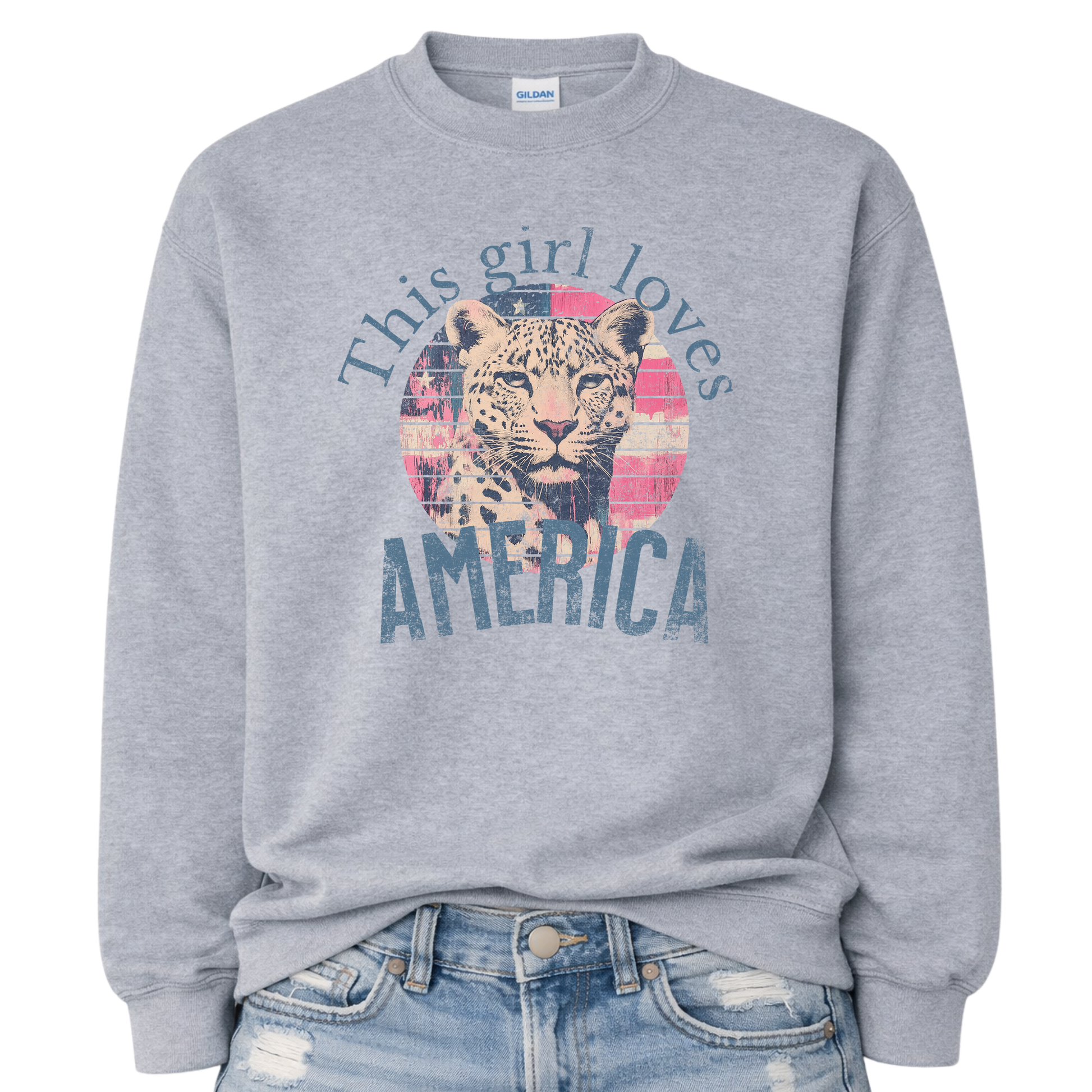 Gray sweatshirt with a graphic of a leopard and text 'This girl loves America' on a white background.