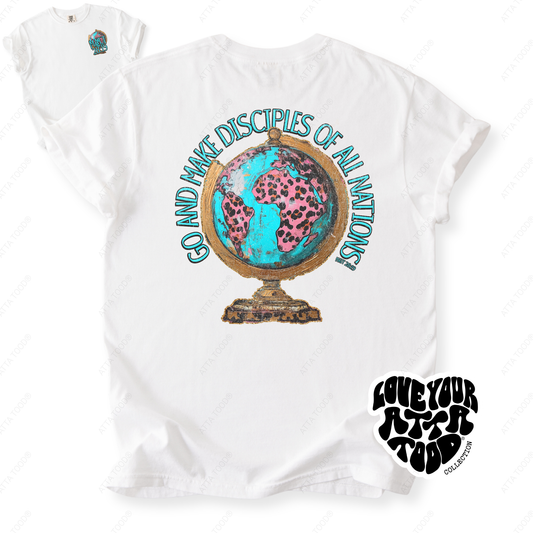 Hand-painted style globe graphic with bold faith message “Go and Make Disciples,” thick paint texture and high-contrast color, printed on a Comfort Colors® garment-dyed tee.