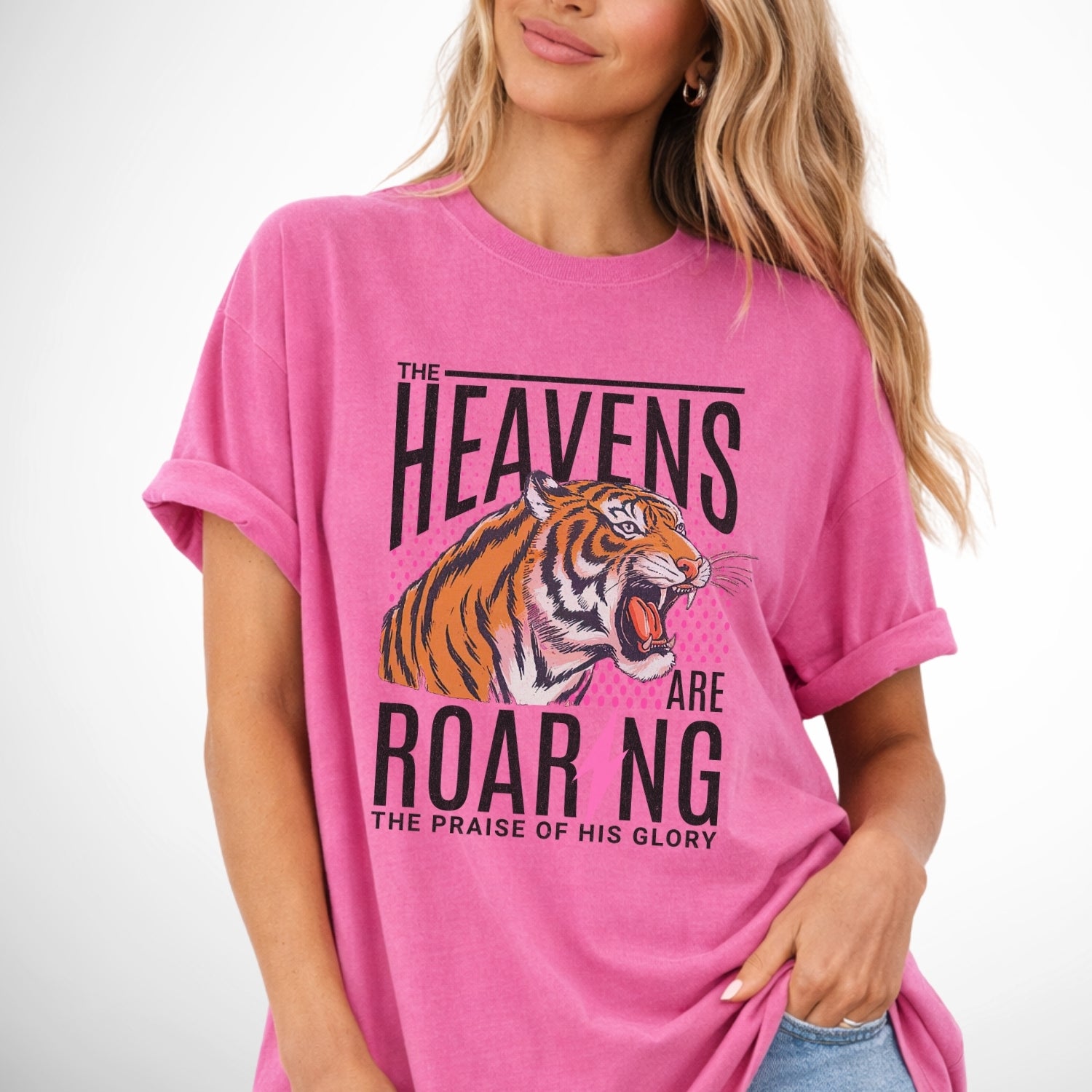 The heavens are roaring the praise of His glory tiger graphic on a comfort colors crunchberry pink tee