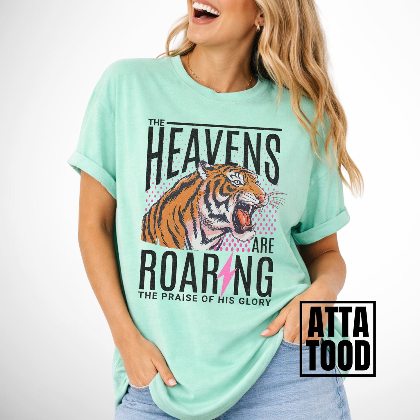 The heavens are roaring the praise of His glory tiger graphic on a comfort colors island reef green tee