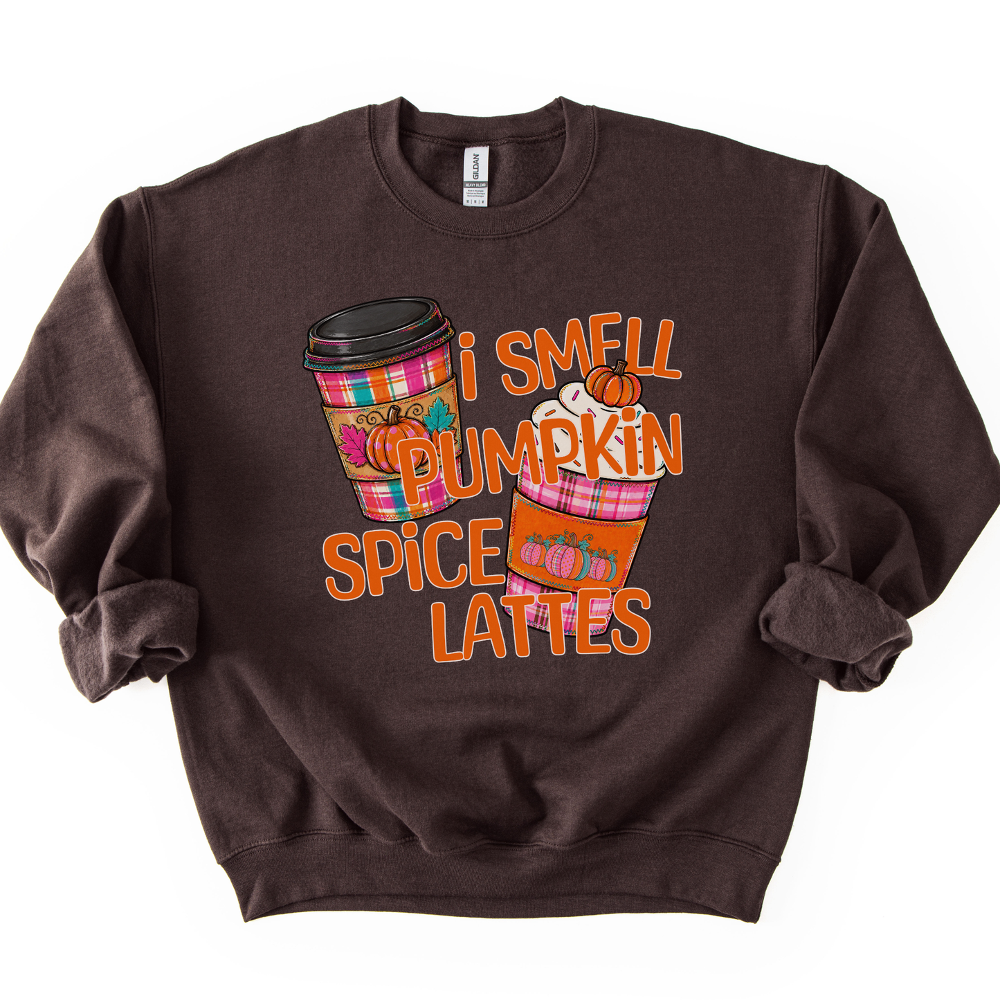 I smell pumpkin spice lattes featuring two coffee cups in fall plaid bright colors, orange, pink and teal with pumpkins on the sleeves of the cup warmers.  Chocolate sweatshirt