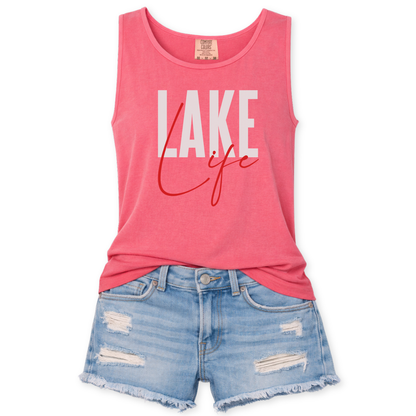 Pink 'Lake Life' tank top with denim shorts on a white background
