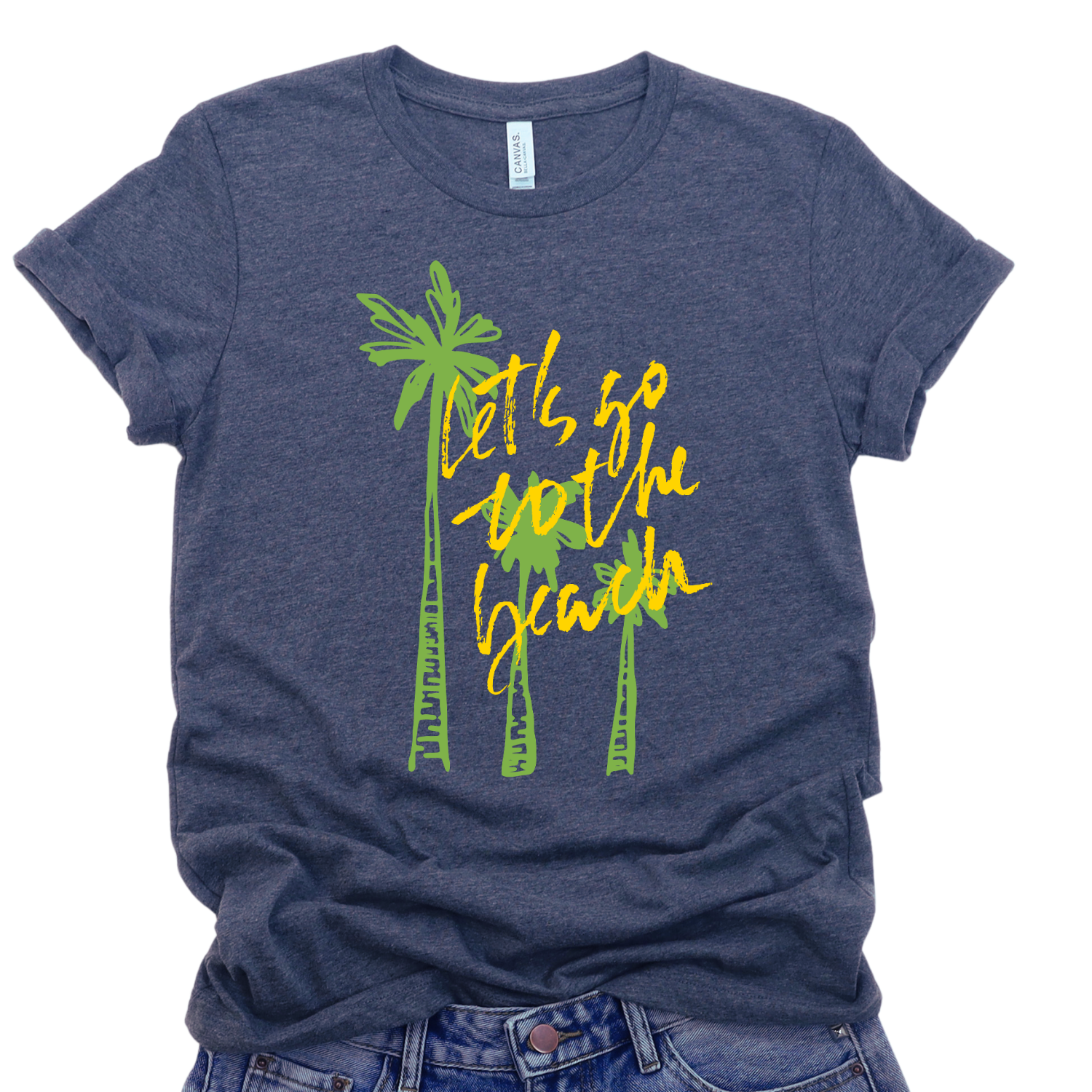 Summer beach graphic on a soft unisex Heather navy graphic tee. The design features three hand sketched palm trees in bright green with bold yellow script reading Lets go to the beach layered over the palms. 