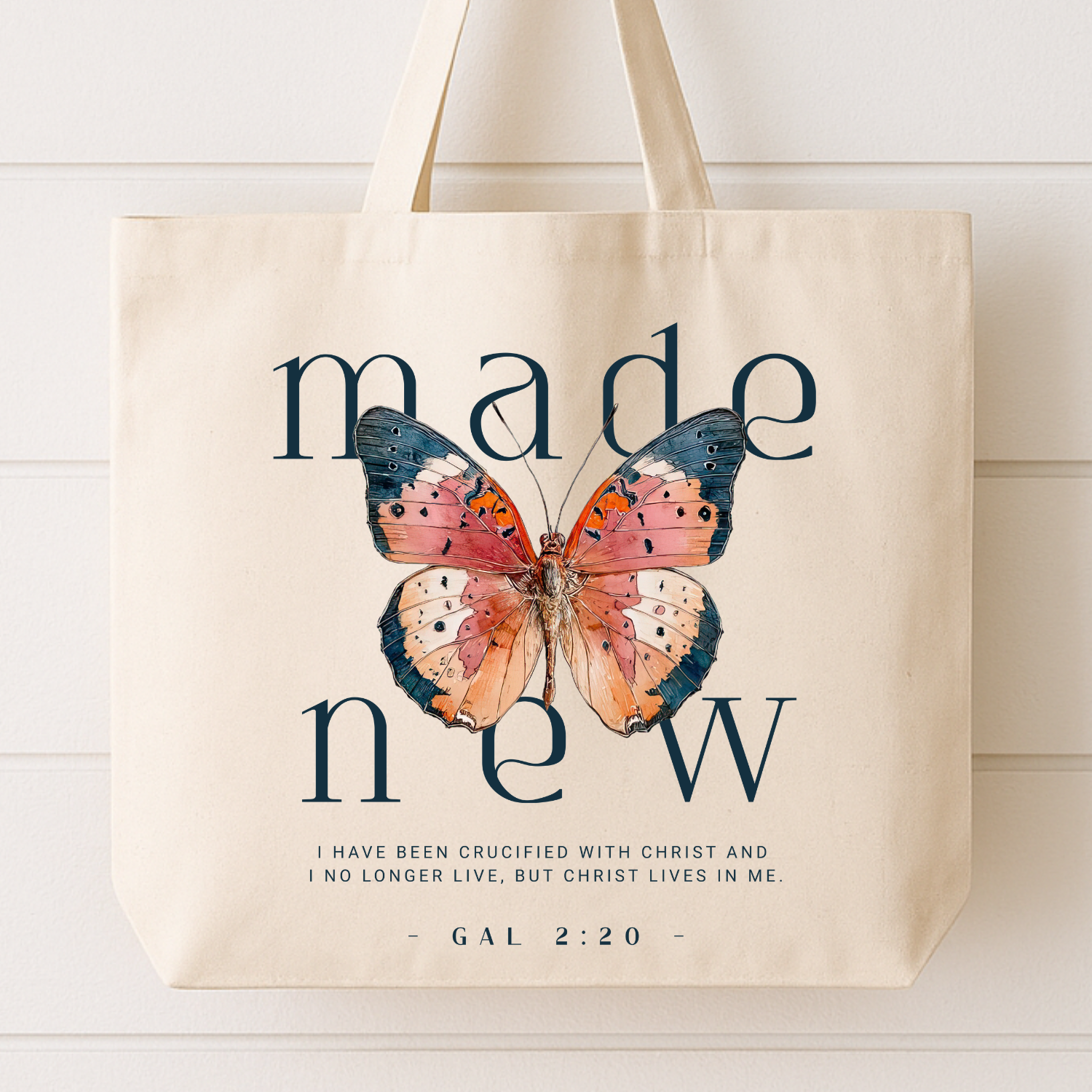 Tote bag with butterfly design and motivational text on a white background.  Fiaith based Galatians 2:20