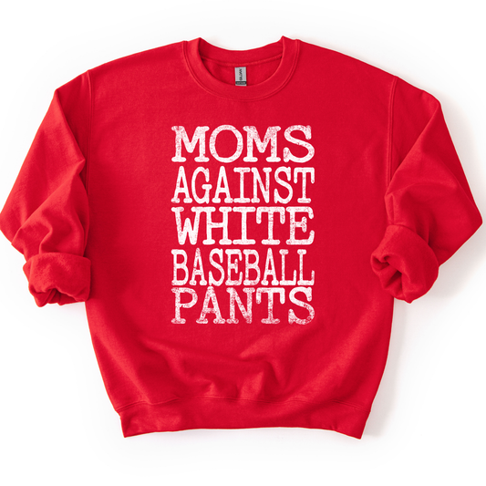 Red crewneck sweatshirt with distressed white block lettering reading “Moms Against White Baseball Pants,” styled flat with sleeves scrunched