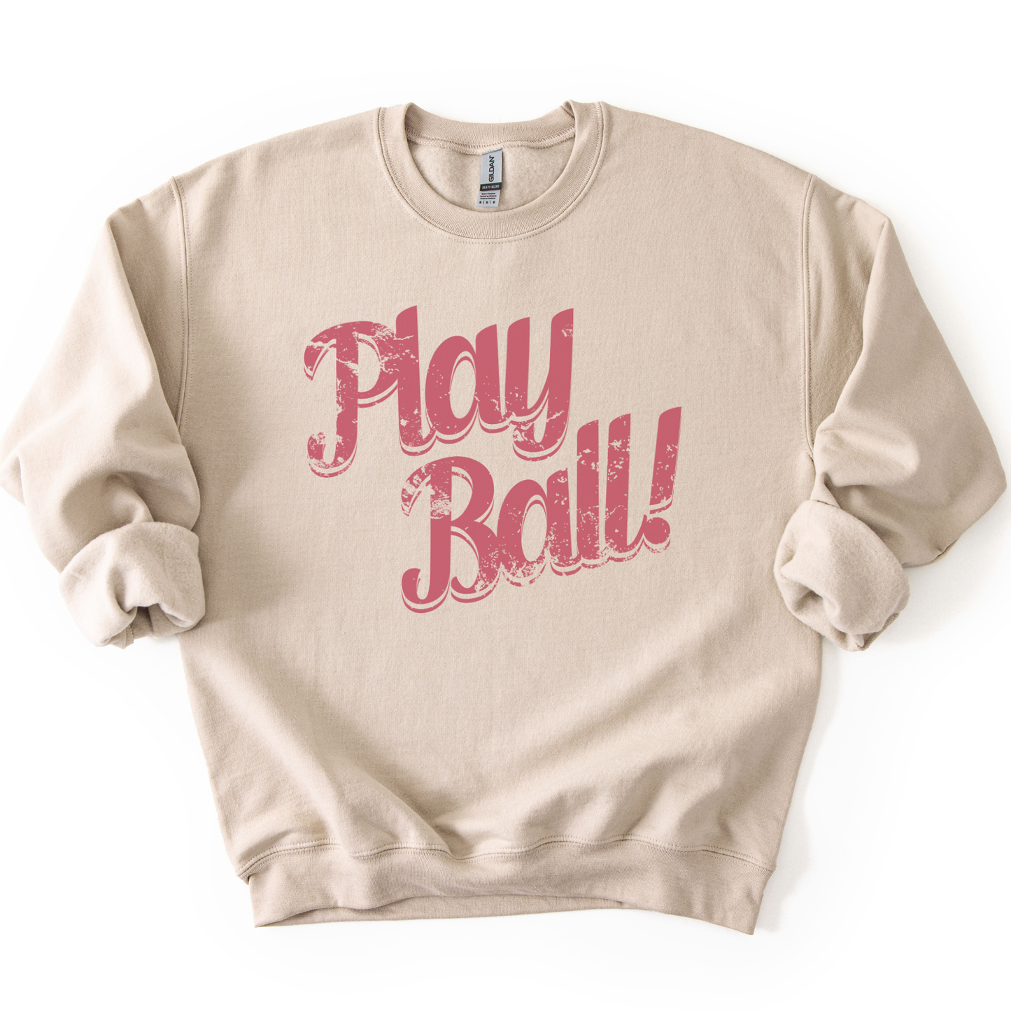 Beige sweatshirt with 'Play Ball!' text in pink on a white background
