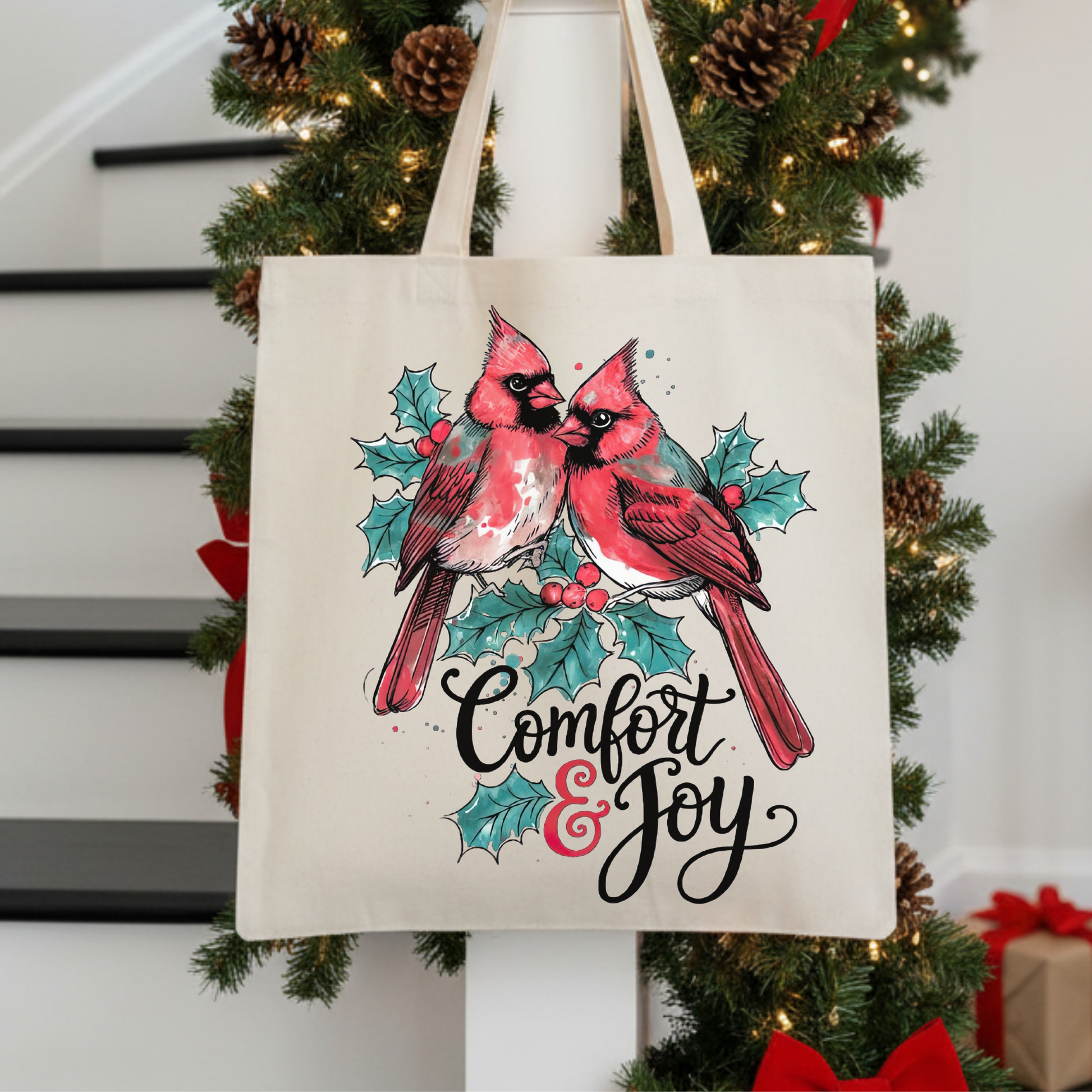 Tote bag with cred ardinals and 'Comfort & Joy' text 