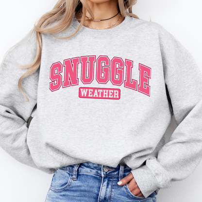 Pink snuggle weather on an ash gray sweatshirt