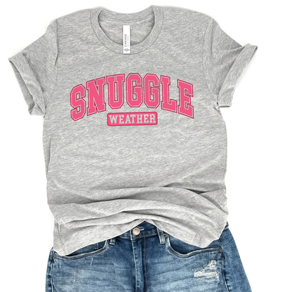 snuggle weather pinkgraphic on a heather gray t-shirt