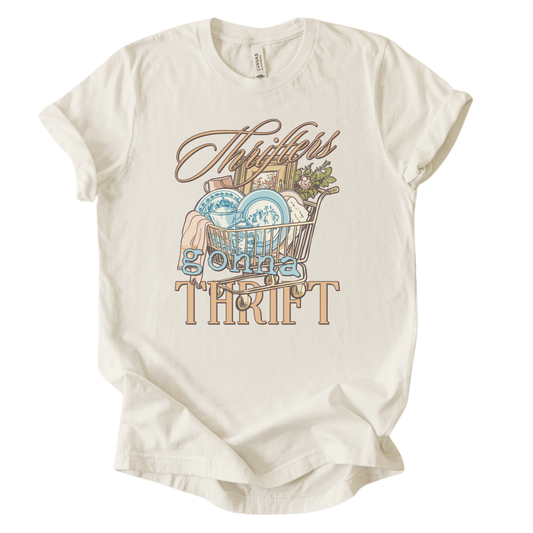 tan Thrifters gonna thrift featuring a shopping cart full of antiques graphic t-shirt printed on a Bella Canvas® premium retail-fit tee.