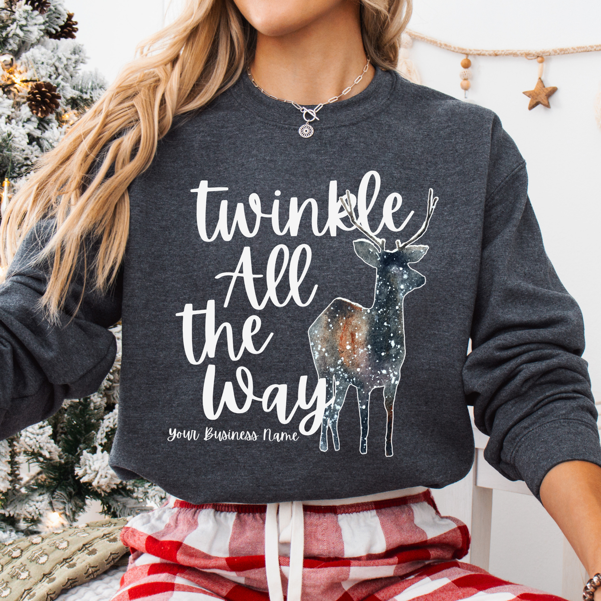 Twinkle all the way custom unisex dark gray sweatshirt featuring a deer with a galaxy overlay that look like twinkling stars.  Customize with business name, State, City, zip code or all.