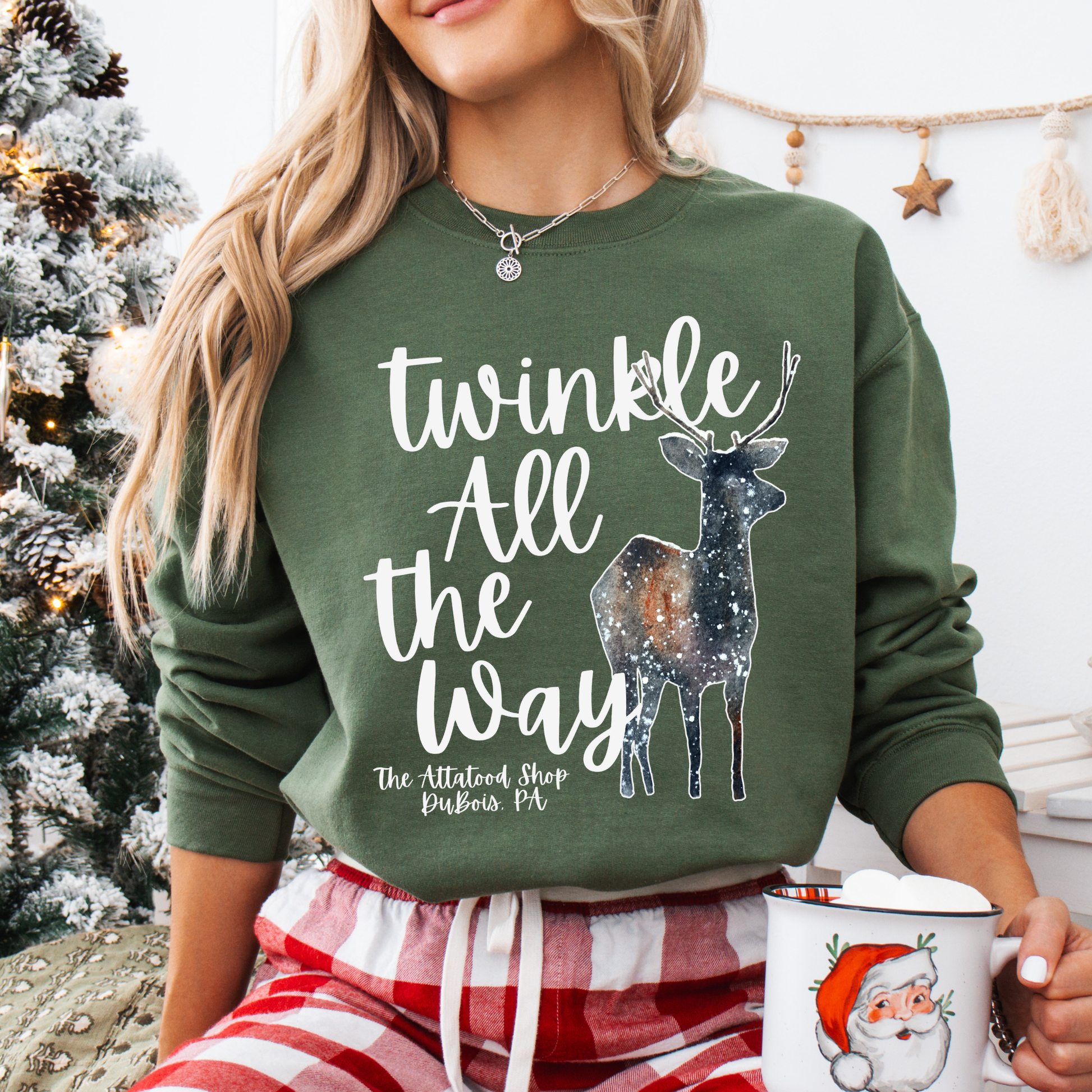 Twinkle all the way custom unisex military green sweatshirt featuring a deer with a galaxy overlay that look like twinkling stars.  Customize with business name, State, City, zip code or all.