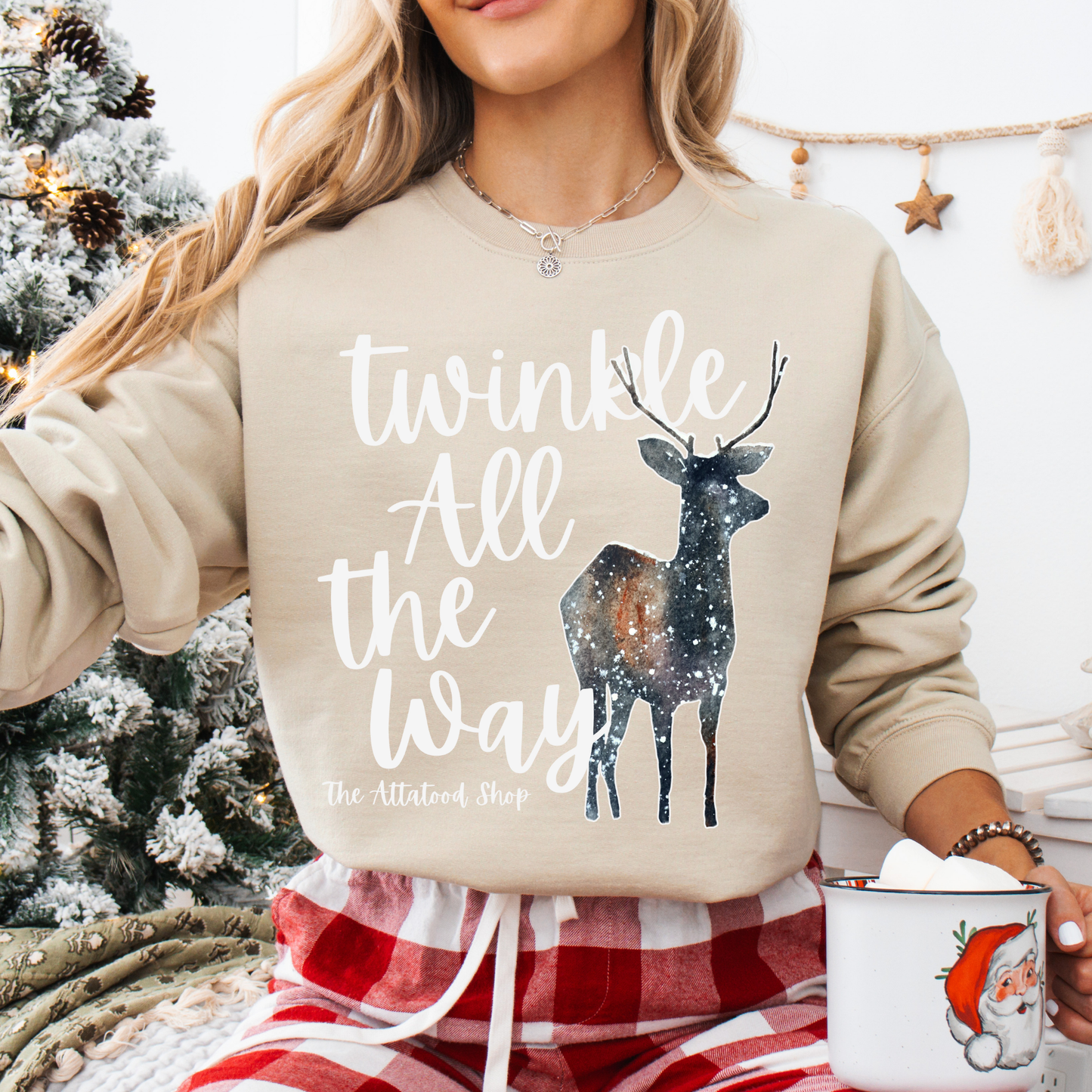 Twinkle all the way custom unisex beige sweatshirt featuring a deer with a galaxy overlay that look like twinkling stars.  Customize with business name, State, City, zip code or all.