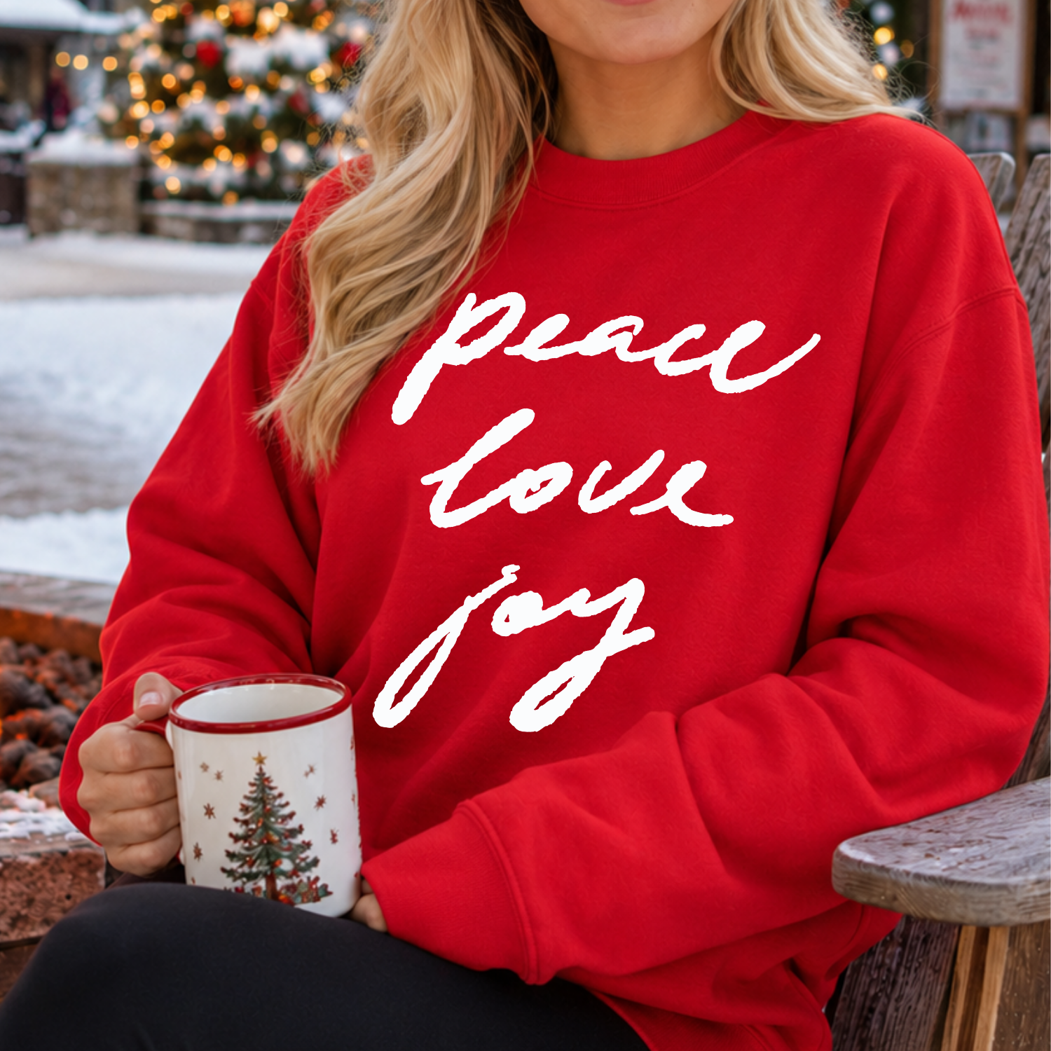 Peace Love Joy White writing Christmas Holiday Graphic on a red Sweatshirt 